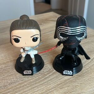 Rey and Kylo Ren Star Wars Funko Pop Bobblehead dolls